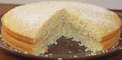 Semolina cake with a portion that is sliced