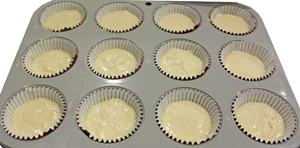 Cupcake mix in cup cake liners, ready for baking