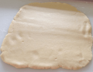 Dough rolled for top of date slices
