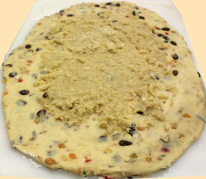 Marzipan applied to stollen dough