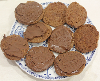 chocolate melted and applied to biscuits